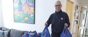 Købmand donerer vinterferieposer til familier i Barnets Blå Hus